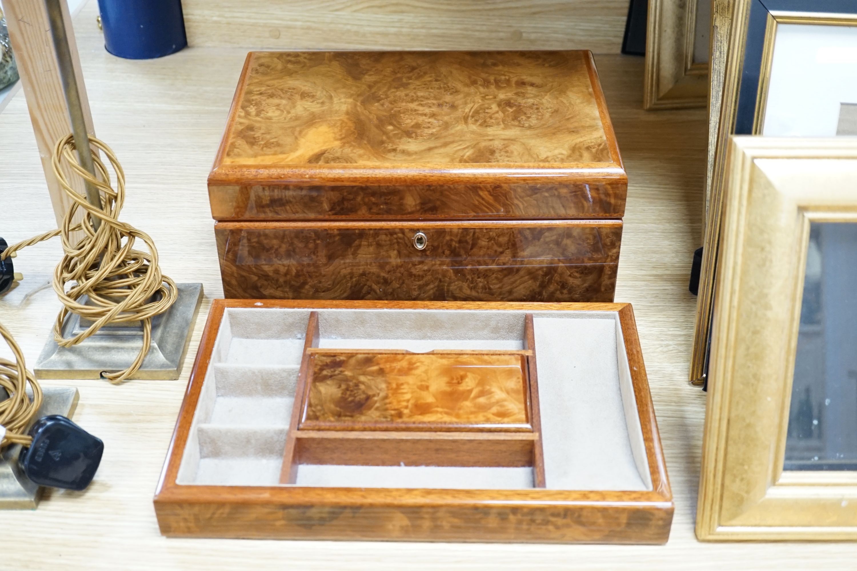 A burr walnut jewellery box, collection of gilt photo frames and a pair of table lamps